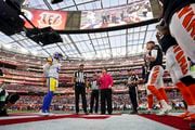 Tennis great Billie Jean King performs the coin toss before the Los Angeles Rams and Cincinnati Bengals meet in Super Bowl 56. (AP Photo/Doug Benc)