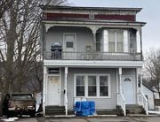 A home on Homer Ave in Cortland where police and a person exchanged gunfire on Monday, Jan 29, 2024. (Sam House | Shouse@syracuse.com)