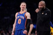 New York Knicks' Donte DiVincenzo (0) talks to Los Angeles Lakers head coach Darvin Ham during the first half of an NBA basketball game Saturday, Feb. 3, 2024, in New York. (AP Photo | Frank Franklin II)