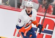 New York Islanders' Mathew Barzal reacts after scoring against the Montreal Canadiens during the third period of an NHL hockey game Thursday, Jan. 25, 2024, in Montreal. (Graham Hughes | The Canadian Press via AP)