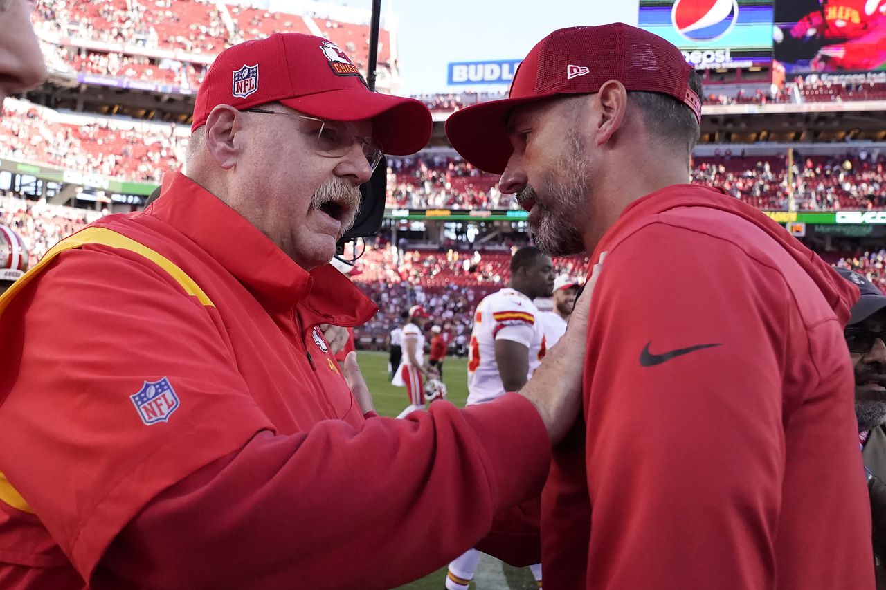 Kansas City Chiefs head coach Andy Reid, left, greets San Francisco 49ers head coach Kyle Shanahan after an NFL football game