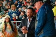 Syracuse Crunch Owner Howard Dolgon talks with a fan before the start of the Third Period of an American Hockey League (AHL) game at the Upstate Medical University Arena in Syracuse, New York on Saturday, October 14, 2023. (Scott Thomas photo courtesy of the Syracuse Crunch)