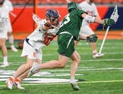 Syracuse midfielder Max Rosa (10) guards against Vermont attack Tristan Whitaker (23) during the season opener at the JMA Wireless Dome, Feb. 4, 2023 in Syracuse, N.Y.
Mark DiOrio | Contributing Photographer