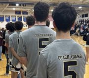 The West Genesee boys basketball team were warmup shirts in honor of Joe Adams who died of brain cancer in 2018. They defeated Fulton 75-71 on Friday night. Photo courtesy of West Genesee Athletics